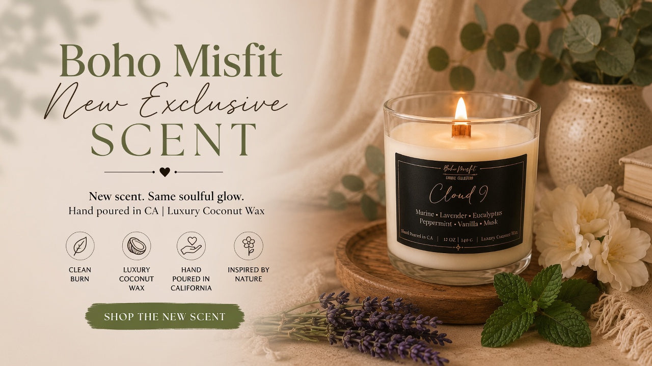 A lit candle in a clear glass jar sits on a wooden tray beside lavender sprigs, mint leaves, flowers, and a textured vase, with promotional text reading 'Boho Misfit New Exclusive SCENT' and smaller product details on a warm beige background.